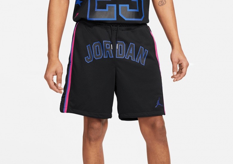black and purple jordan shorts